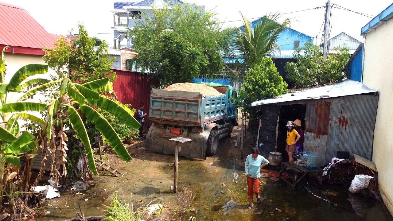 First Starting New Project Landfill Delete Trash Water Use D20P Dozer Pushing Sand & Truckload Sand