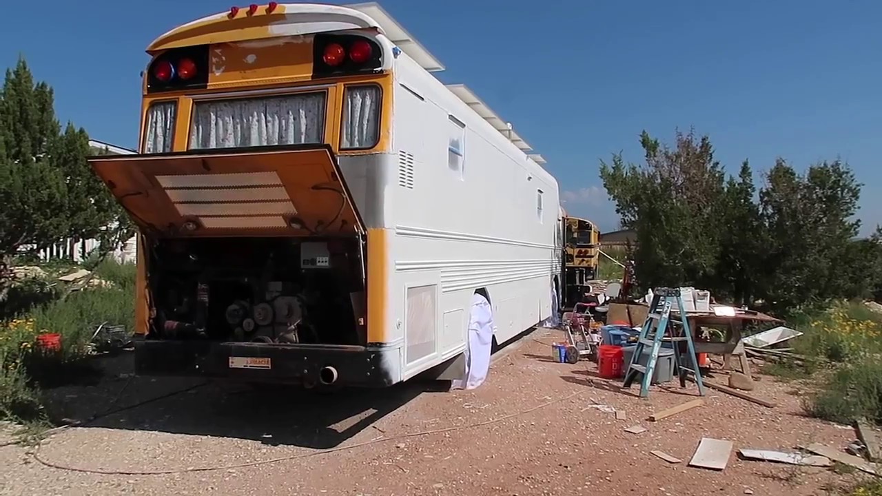 School Bus Conversion to Motor Home #61  primer and paint. construction of composting toilet.