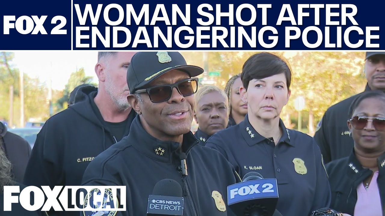 Woman shot after threatening Detroit officer