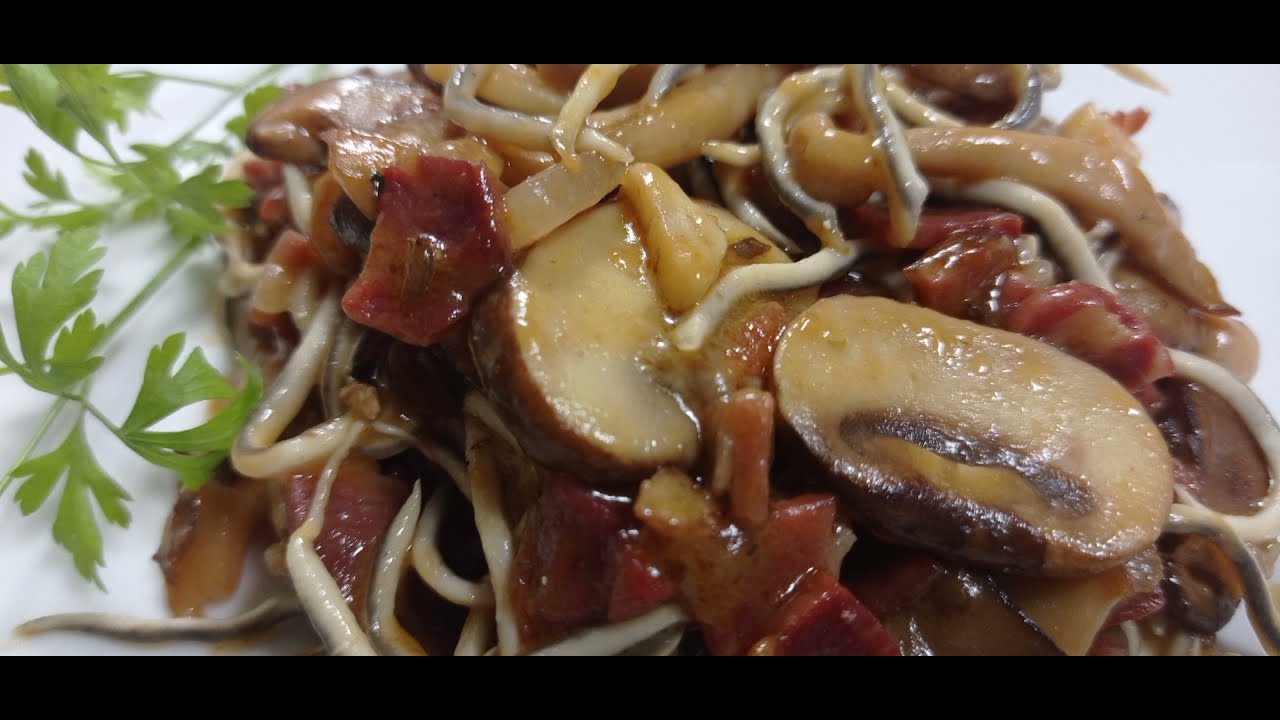 Champiñones con gulas y jamón a la parmegiana