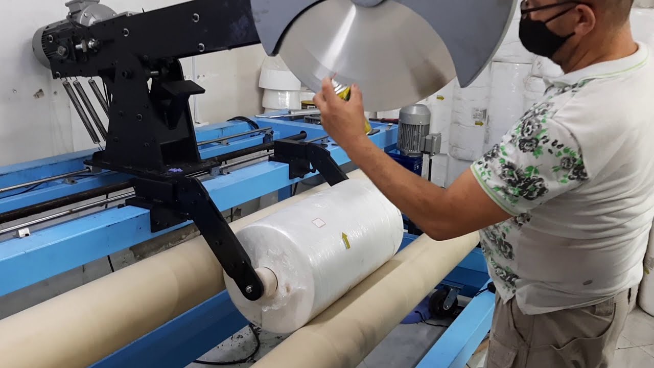 Cortadora de rollos de tela no tejida, corte por cuchilla no dentada motorizada