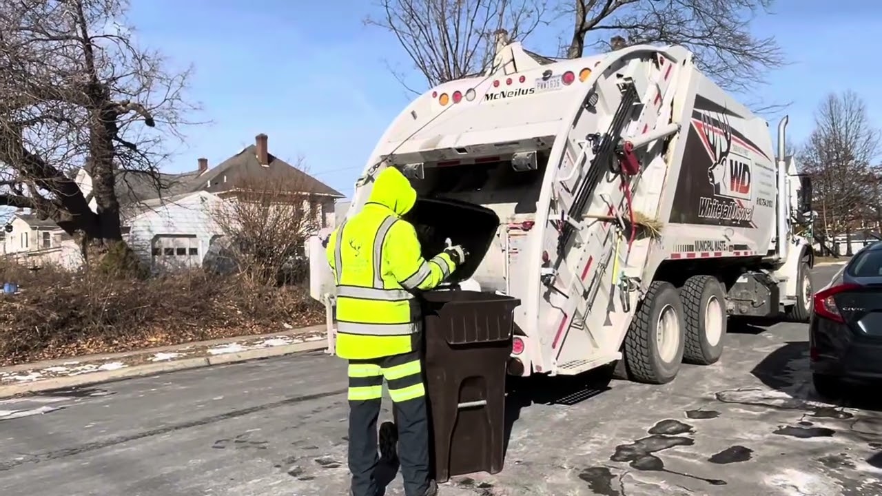 Whitetail Disposal freightliner Mcneilus rear loader on post snow storm trash pickup