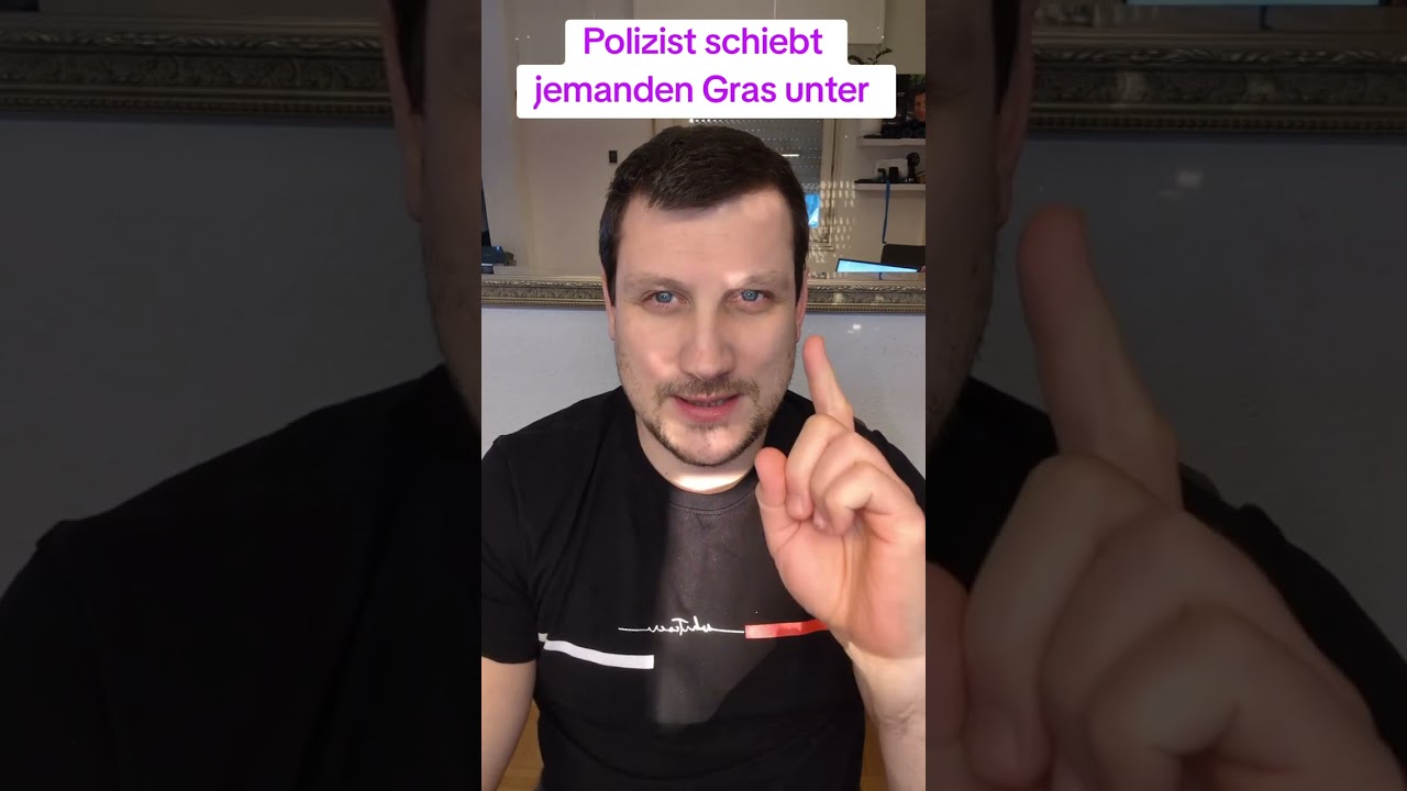 Polizist schiebt jemanden Gras unter 