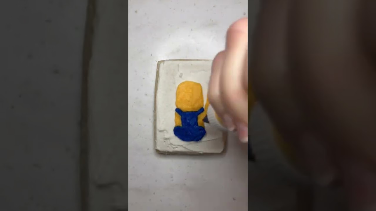 Minion sugar cookie with buttercream frosting