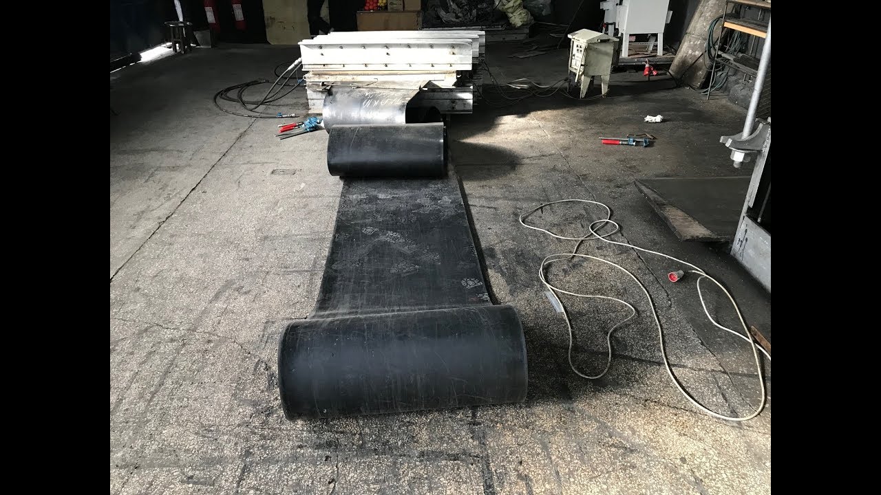 Hot splicing of heat resistant belt with a hydraulic vulcanizing press and the material Multiface
