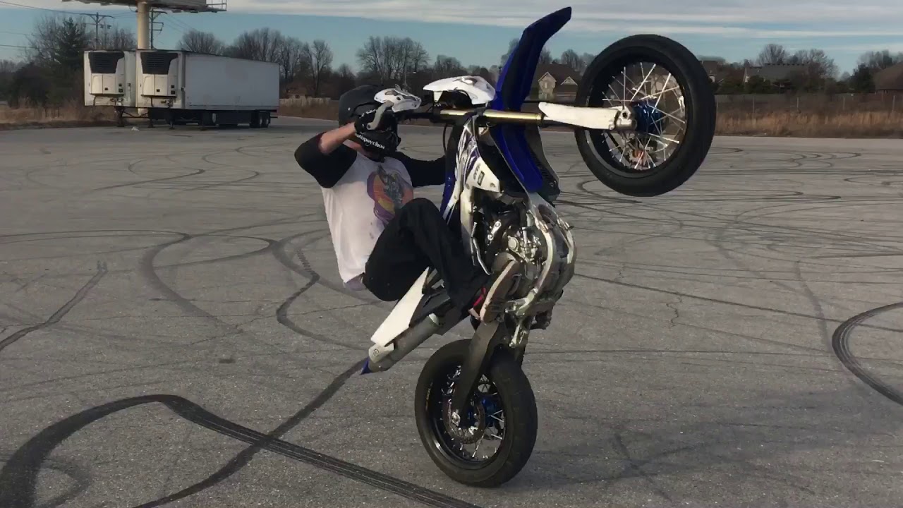 WR250F SUPERMOTO stunts no brake circles!!! Flips stoppie!