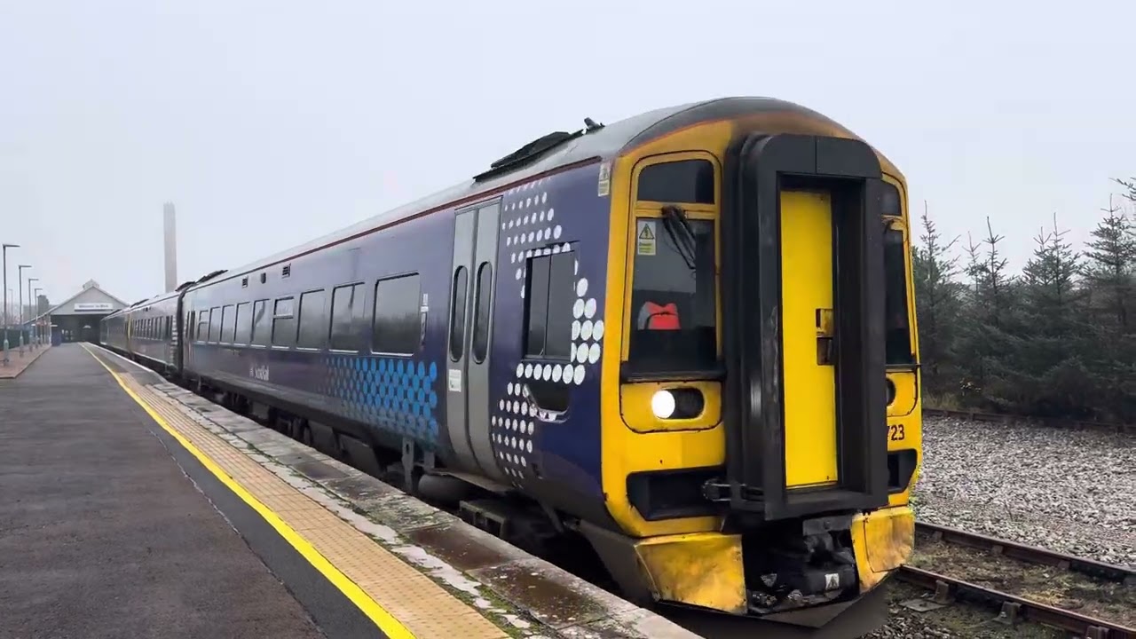 Train leaving wick station 