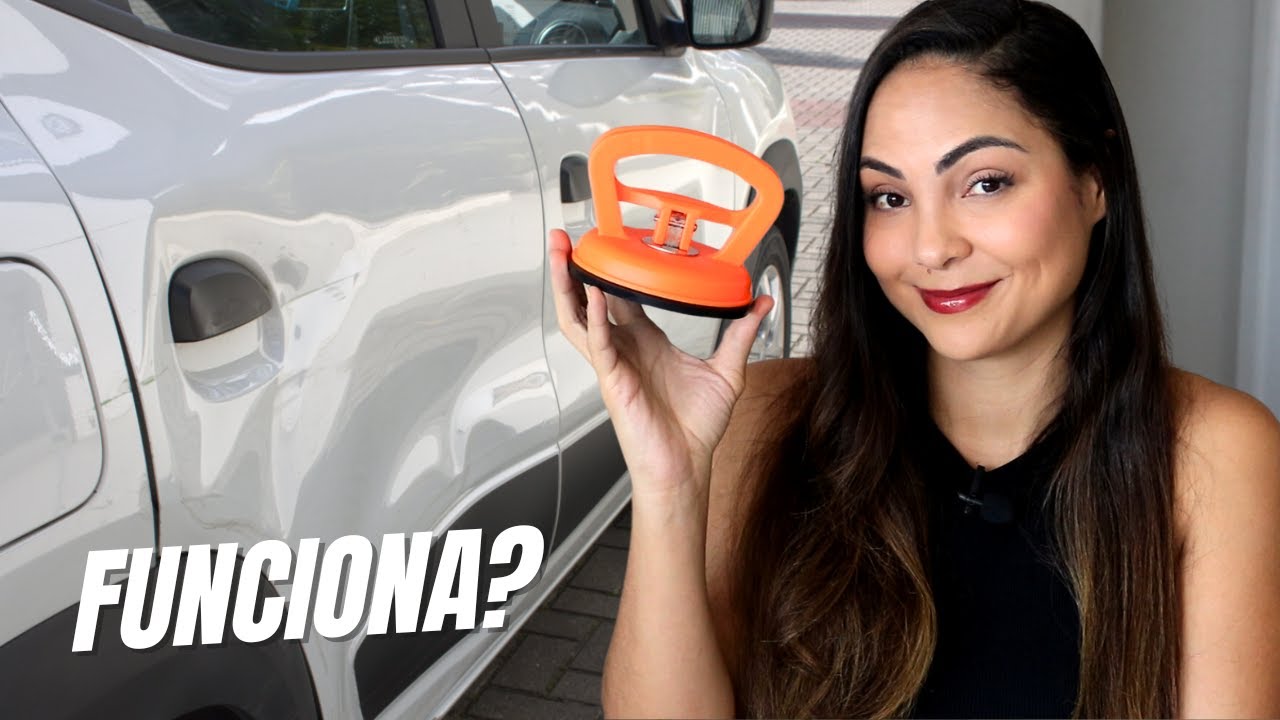 Usando a ventosa de sucção para desamassar o carro
