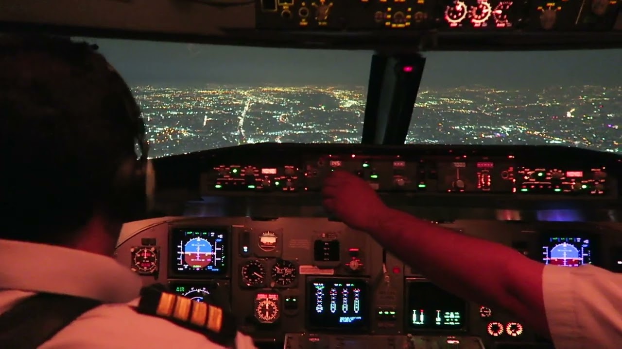 FOKKER F100 ILS APPROACH RUNWAY 29L TEHRAN FROM BUSHEHR AT NIGHT.