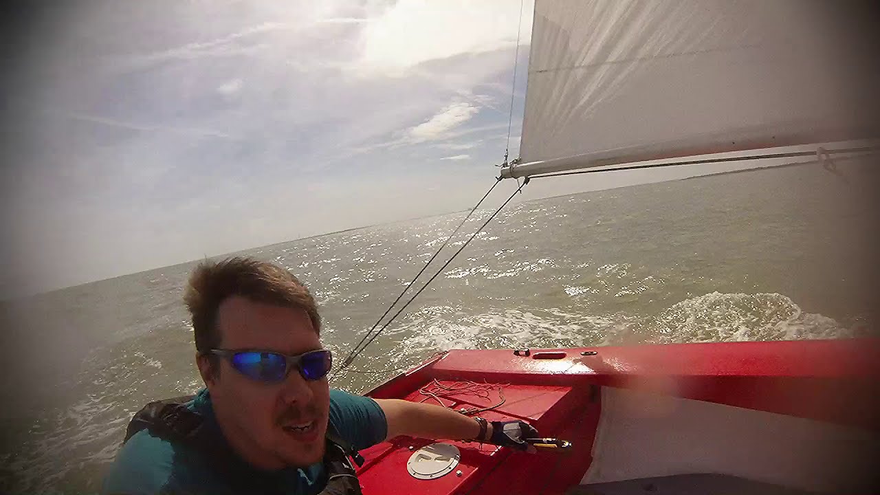 Wayfarer sailing on the River Blackwater, sea kayak and spinnaker