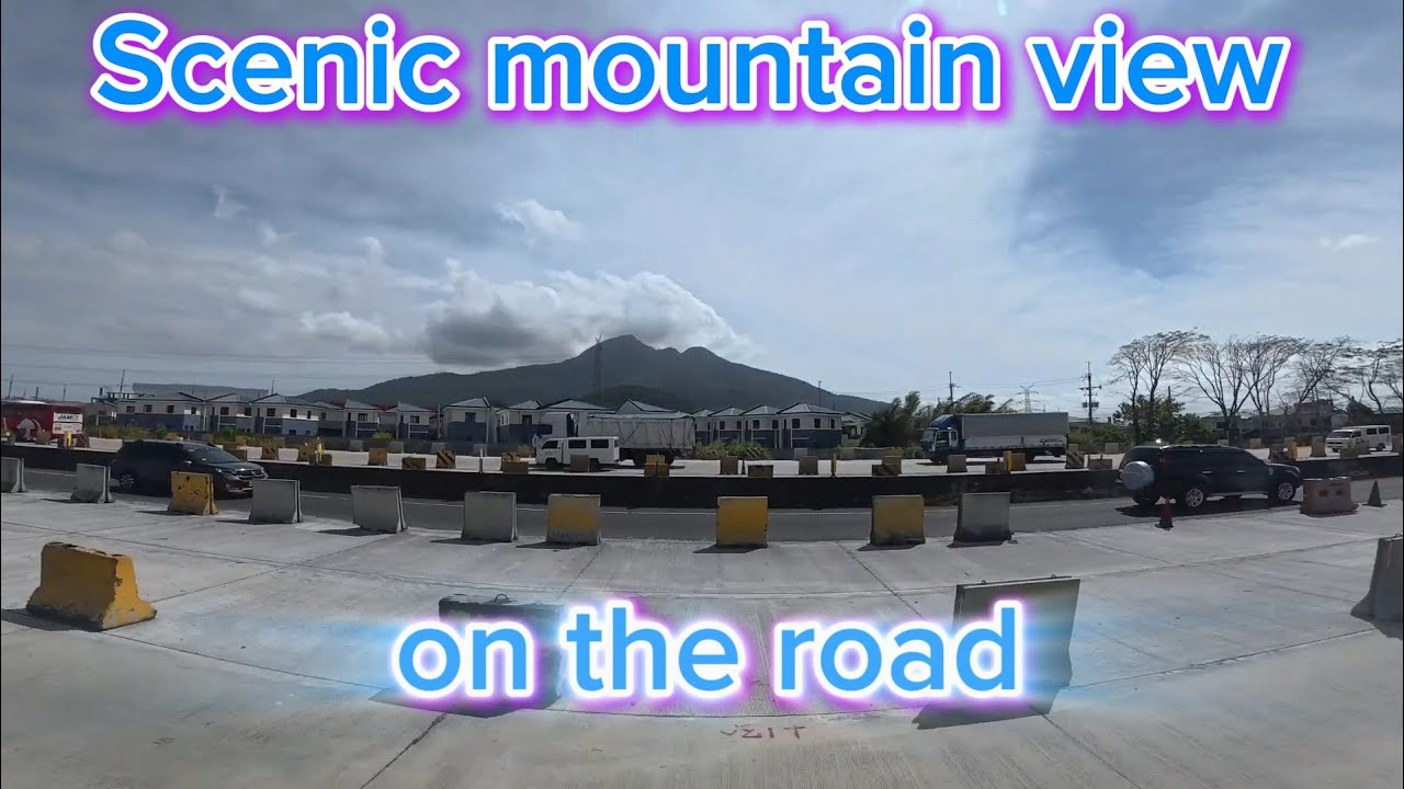 BEAUTIFUL MOUNTAIN SCENERY ON THE ROAD 