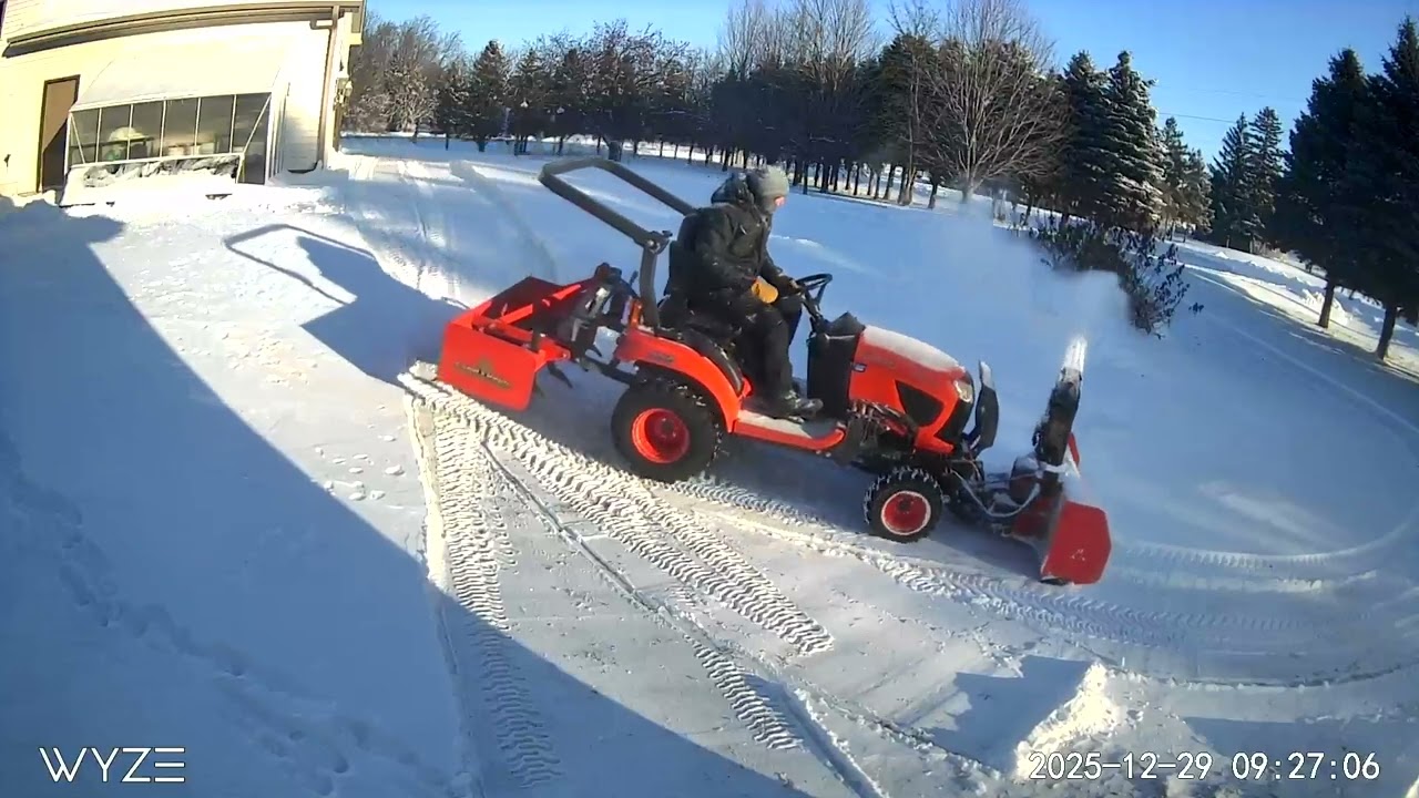 Snowblowing with the Kubota on a gravel driveway