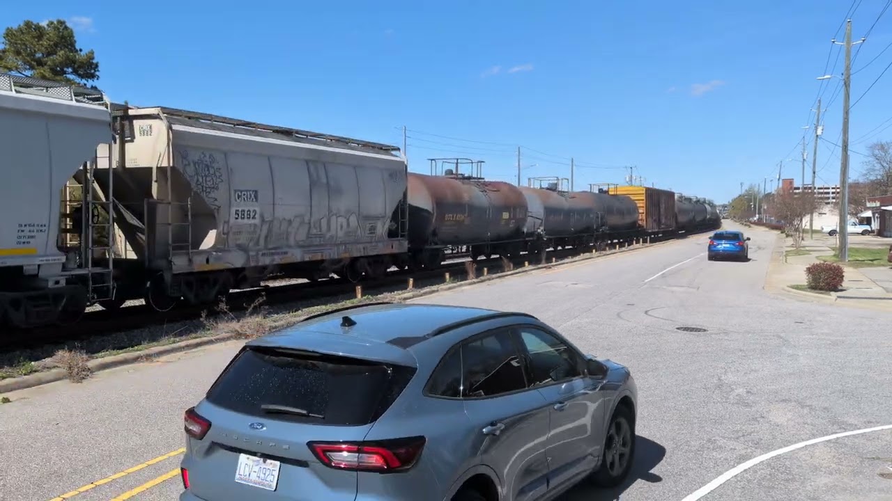 CSX 4729 and CSX 4551 lead a south bound mixed freight through downtown Fayetteville 3/17/2026