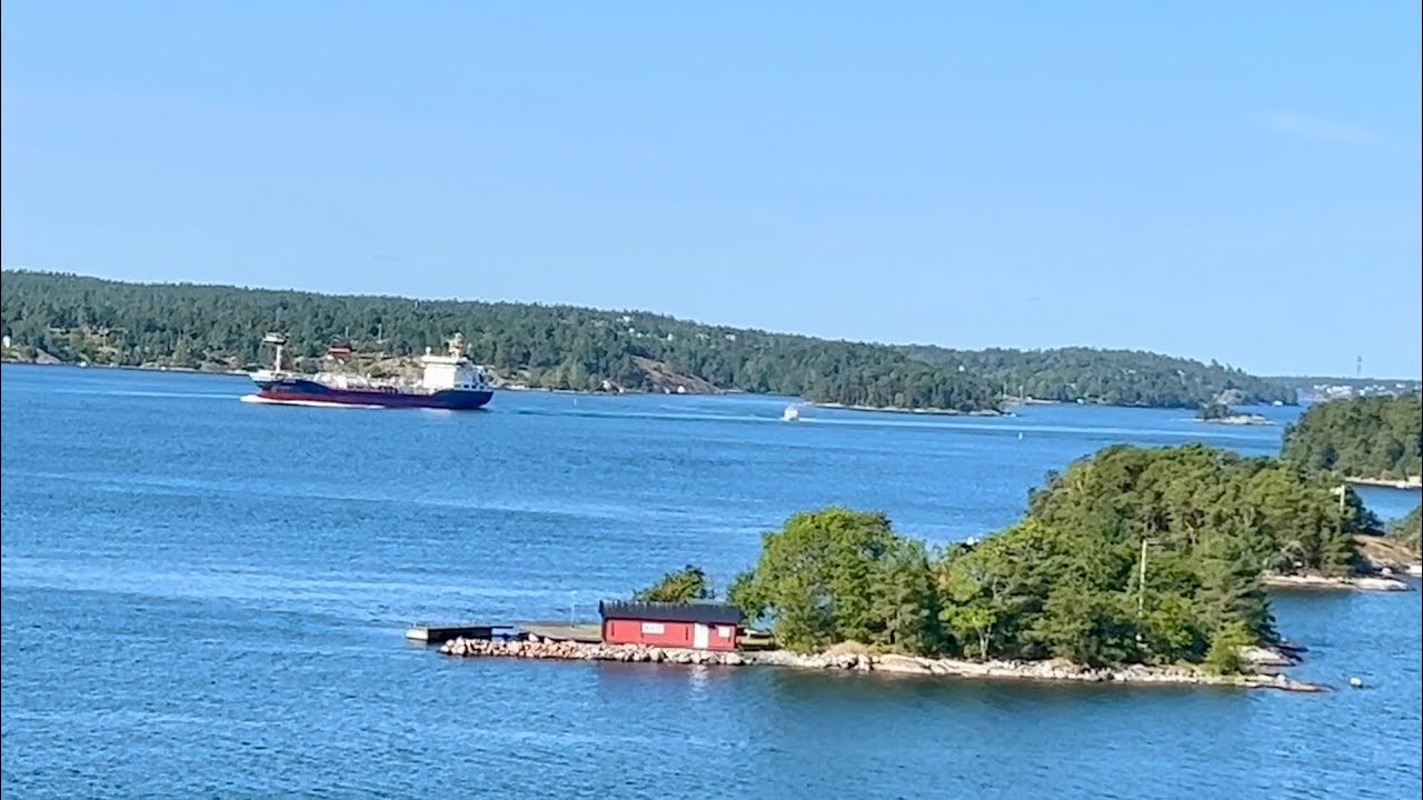 Stockholm archipelago slowly passing by while walking along cruise ship Viking Line