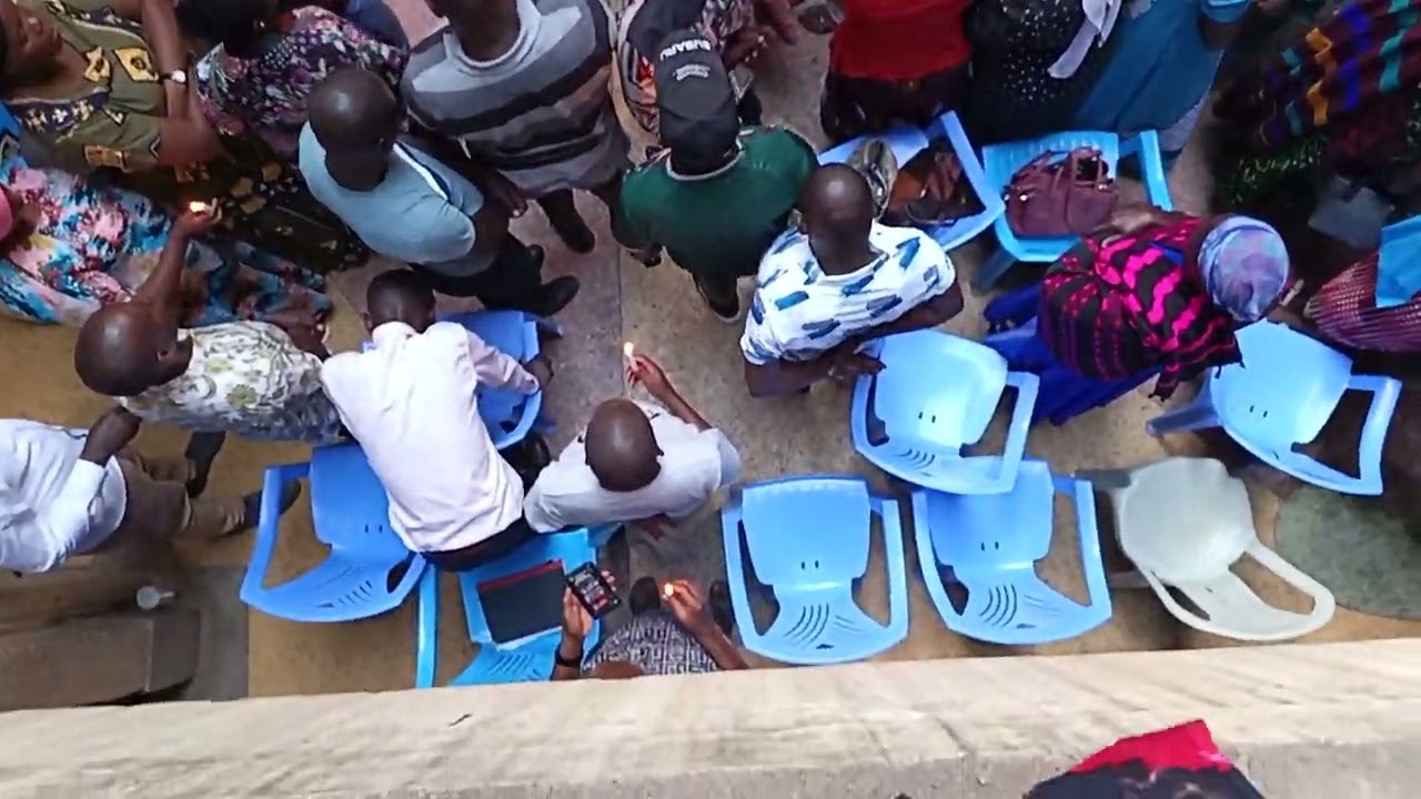 Candle lighting during erustus funeral in kayole