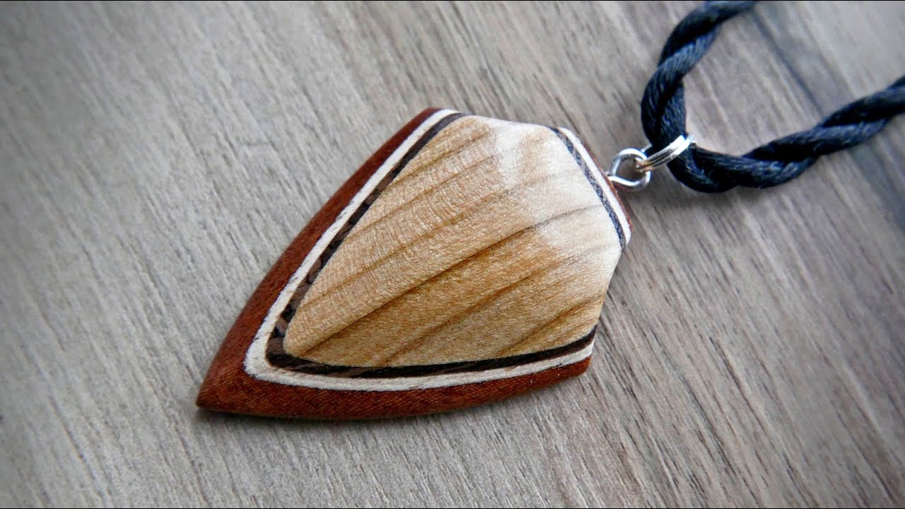 Homemade necklace made of wood and veneer