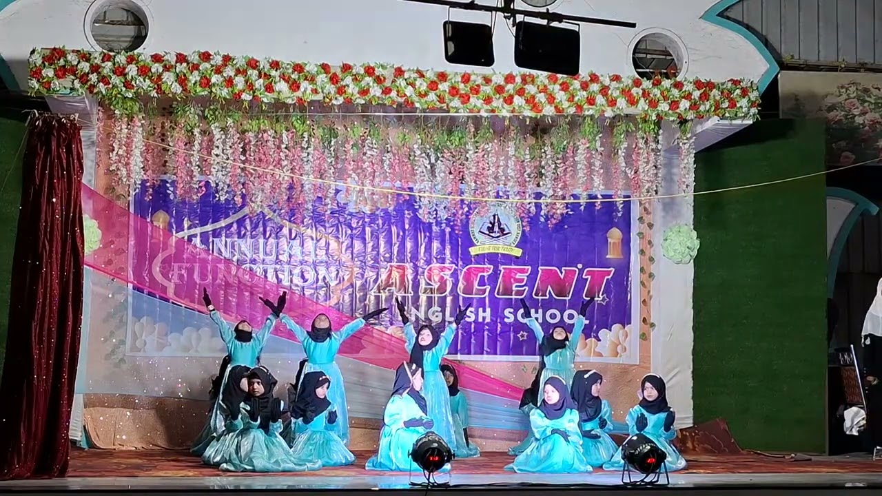 Zameen ko dekha falk ko dekha U. KG class performance 