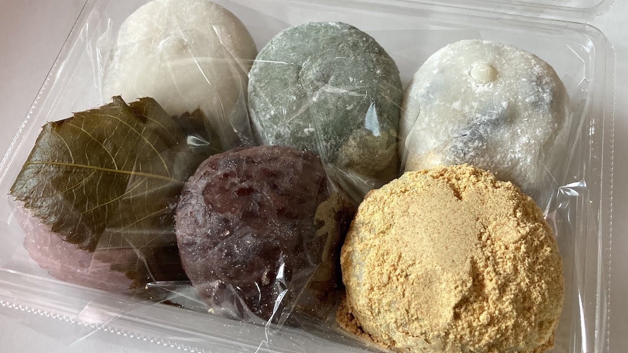 Eating Ohagi, Kusamochi, Daifuku, and Sakuramochi from Tambaya. Traditional Japanese wagashi