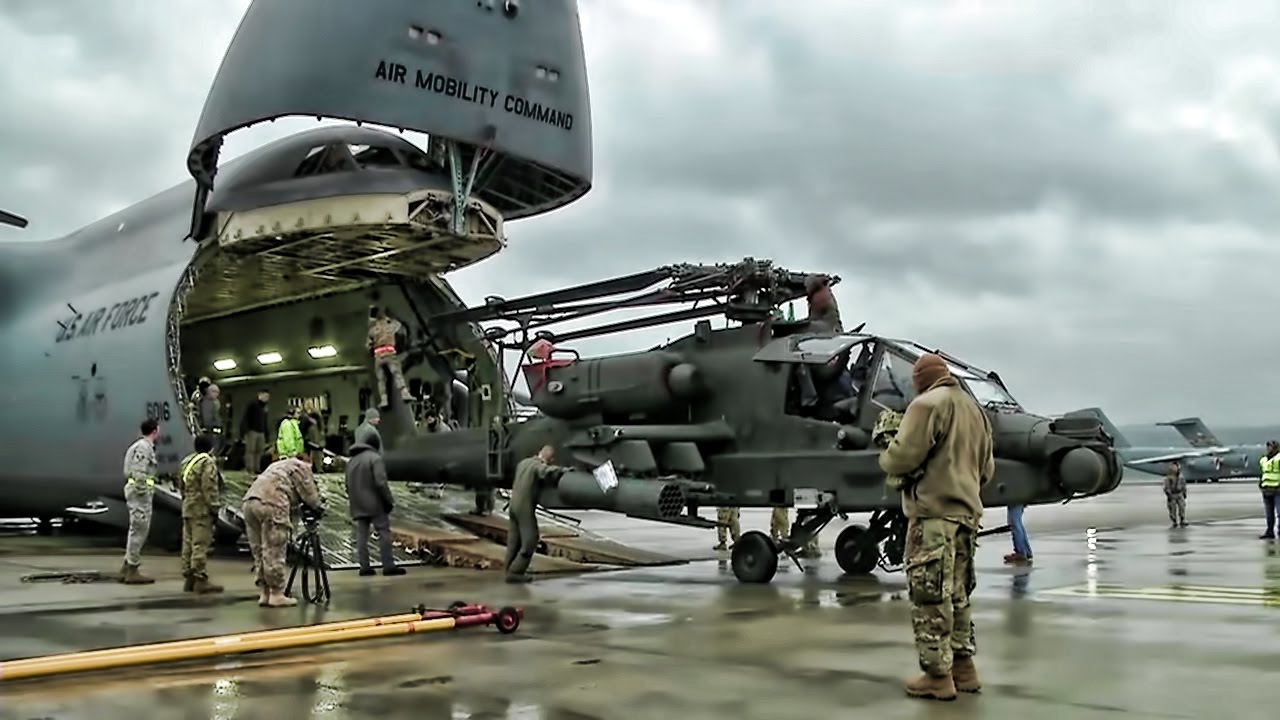 Apache Helicopters Offload From C-5M Super Galaxy In Germany