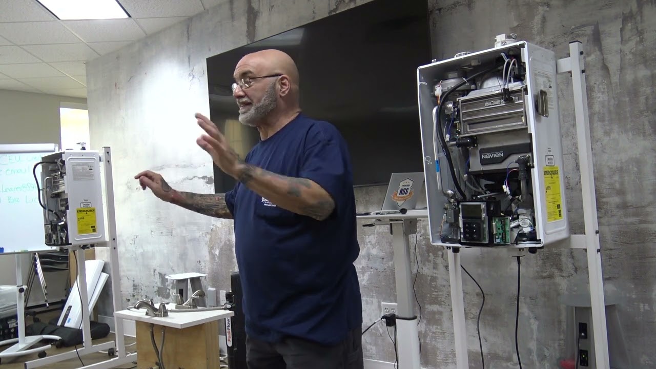 Training plumbers on how to correctly install a tankless with Navien