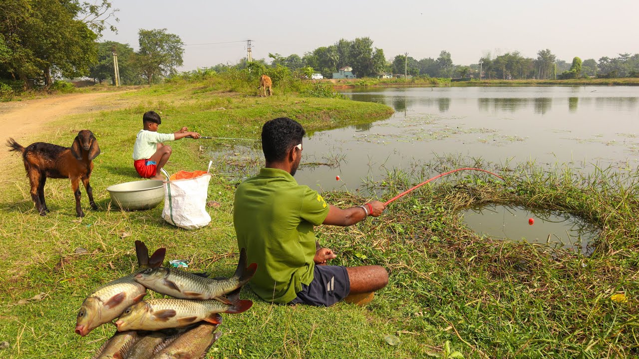 Fishing Video || Two expert fisherman fishing together in the village pond using hooks || hook trap