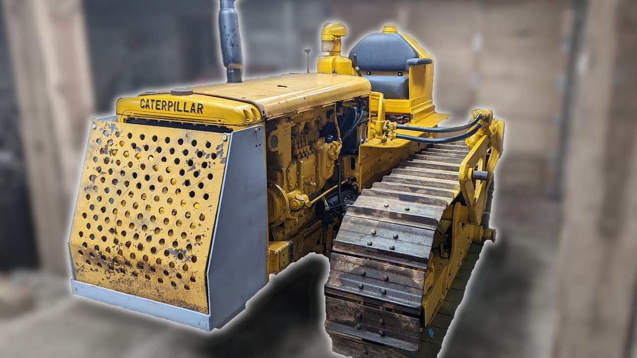 Повторная затяжка болтов головки Caterpillar D4, установка защитных кожухов и гидравлических элем...