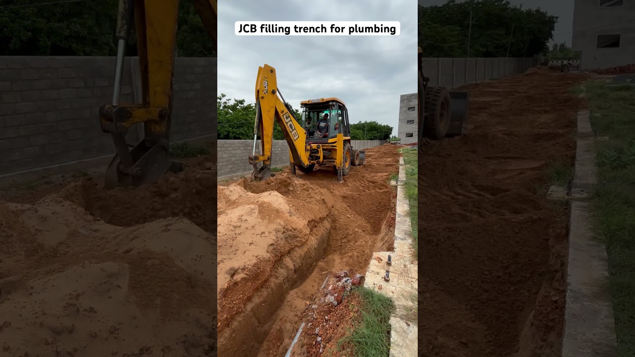 JCB filling trench for plumbing