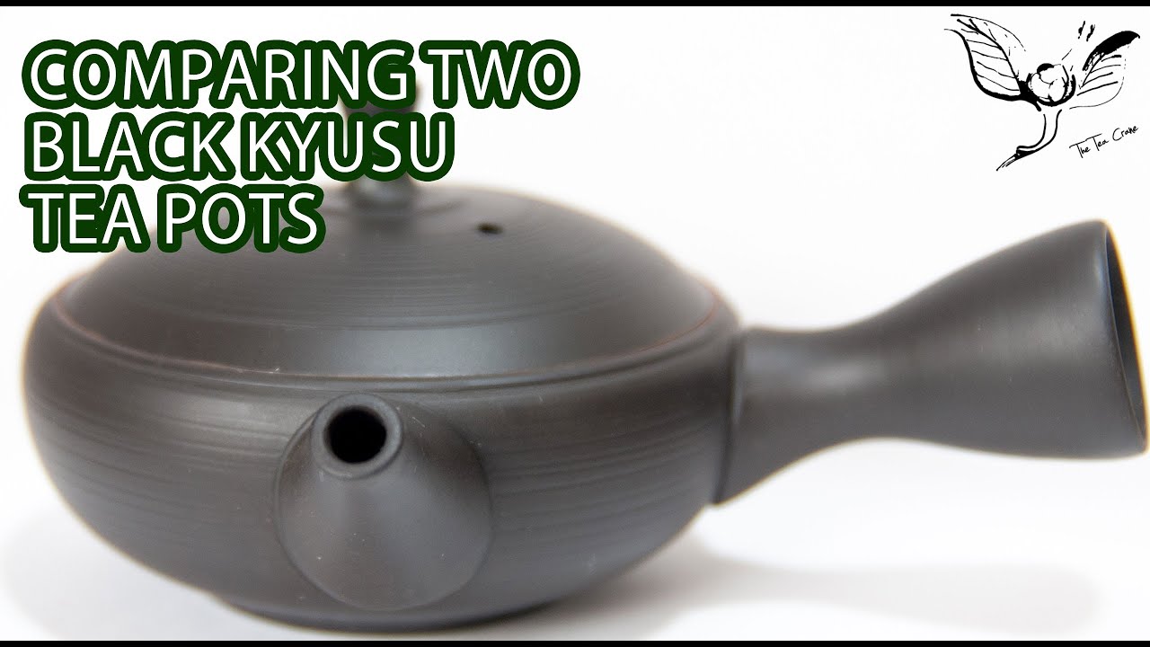 Comparing two black Tokoname kyusu tea pots.