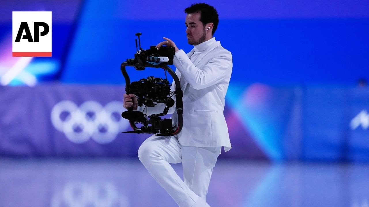 Olympic skating has a new addition: A backward-skating cameraman
