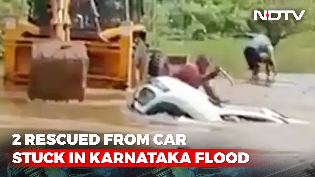 Windshield Smashed Just In Time, 2 Rescued From Car Stuck In Karnataka Flood