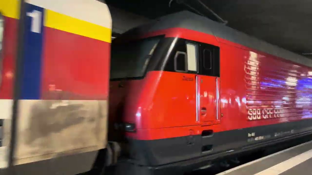 Departure RE 460 Intercity with IC 2000 Wagons