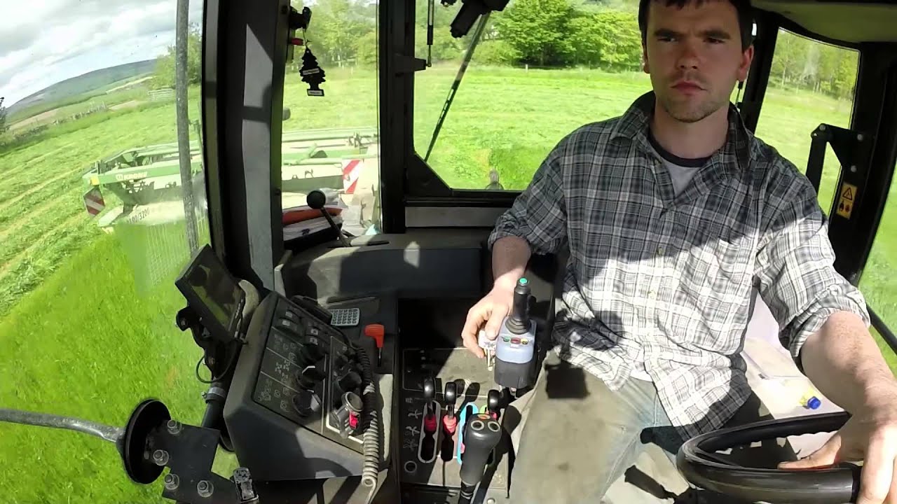 JCB Fastrac with Krone and Kuhn mowers cutting silage.