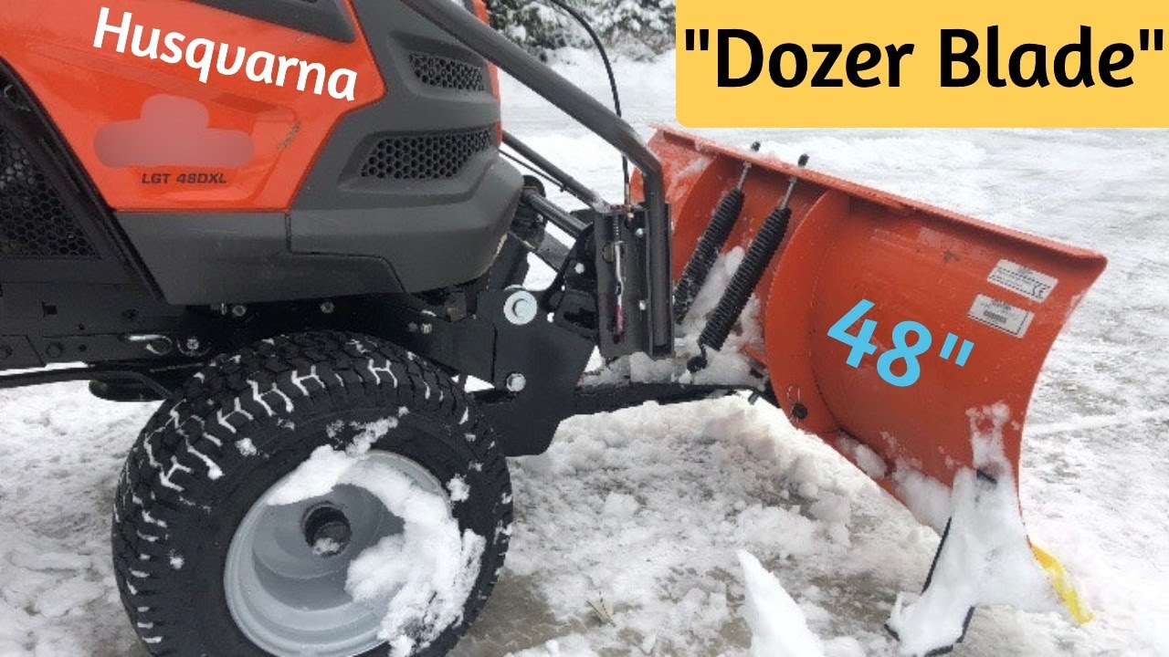 Husqvarna Dozer Blade Plowing Snow (48