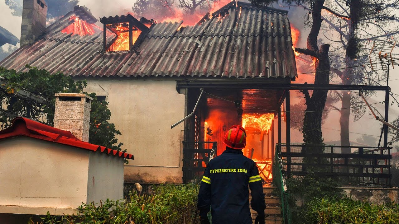 At least 60 dead as Greece wildfires rage