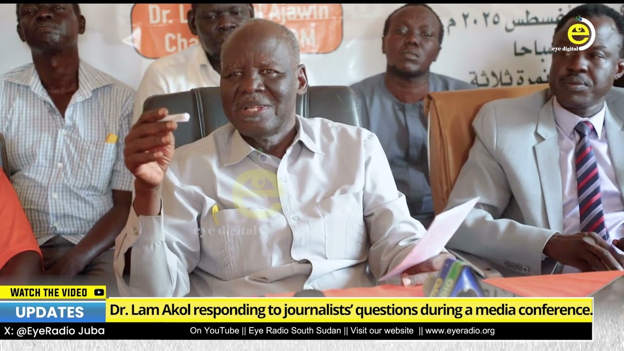 Dr  Lam Akol responding to journalists’ questions during a media conference