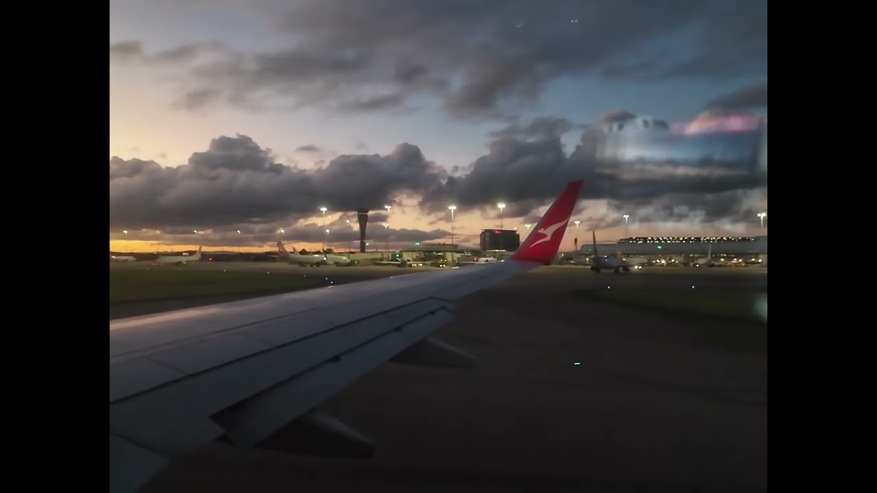 Night flight from Brisbane to Sydney, Australia. Great sunset view flying out from Brisbane!