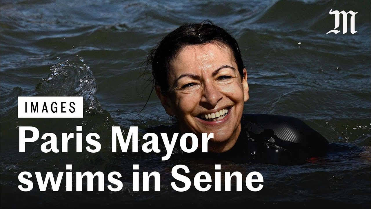 Paris Mayor Anne Hidalgo takes a dip in the Seine