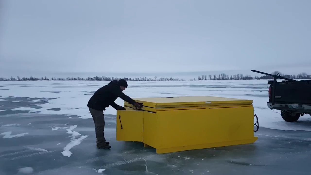 Mark Deploying his ice shack from his truck