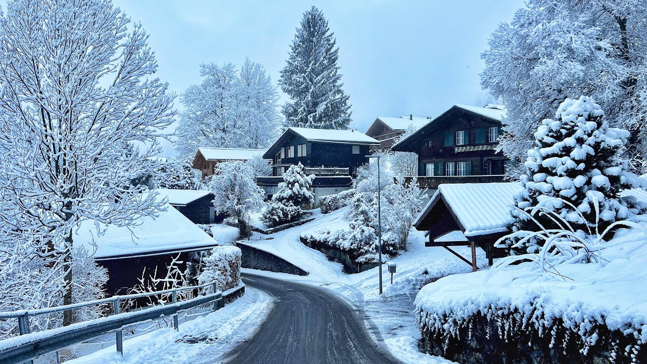 Snowy morning walk in Grindelwald, Switzerland 4K - peaceful snowing in a fairytale village