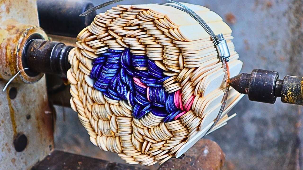A stunning wood carving - A smooth combination of ice cream sticks and epoxy resin on turned wood.