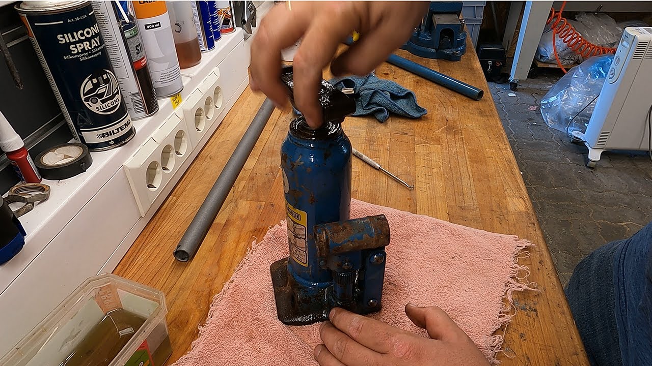 Rusty bottle jack restored
