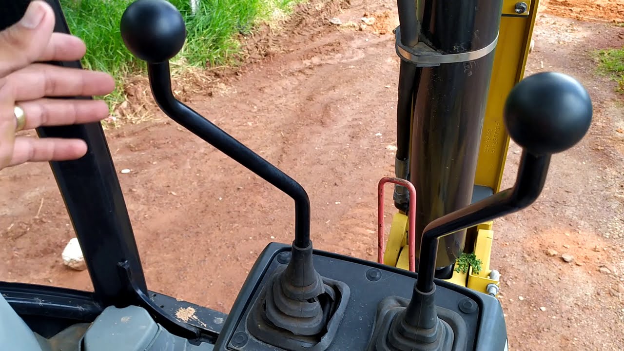 Como operar retroescavadeira 2 comandos CAT 416 E