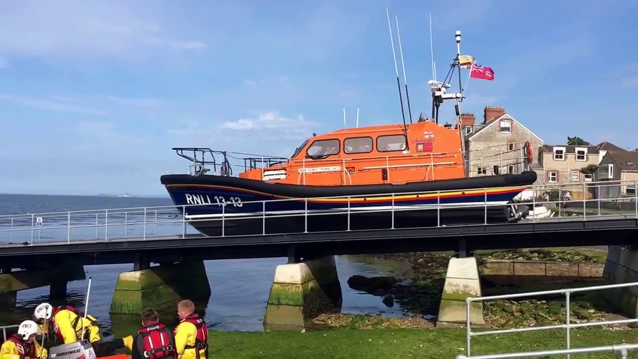 RNLI Shannon Class and D Class lifeboats launch at Swanage