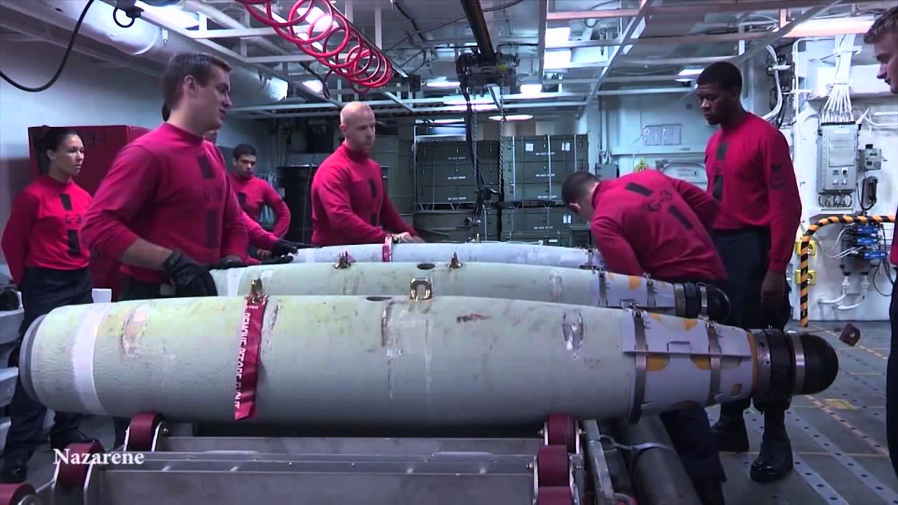 Navy Ordnancemen Making Bombs & Loading