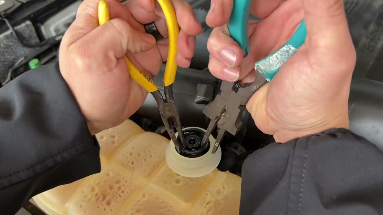 Ford broken cap removal from coolant ￼ reservoir