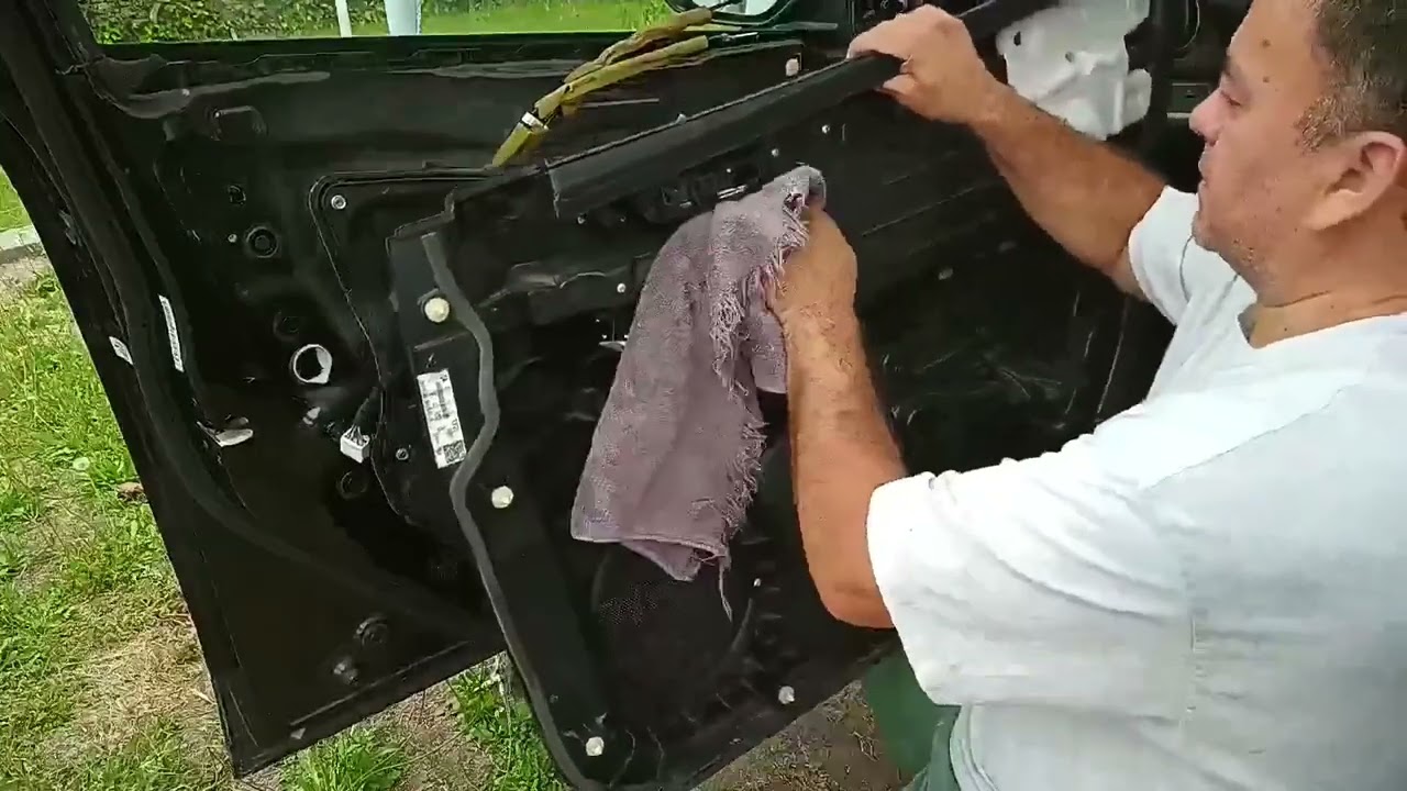 2012 Mazda 3 - Driver Door lock broken cable replacement and more  sound deadening.