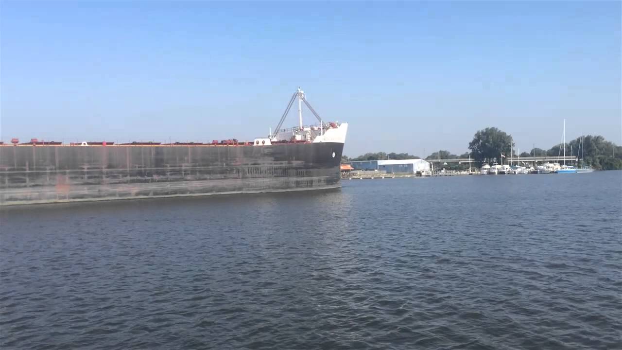 American Courage freighter makes its way down Saginaw River in downtown Bay City