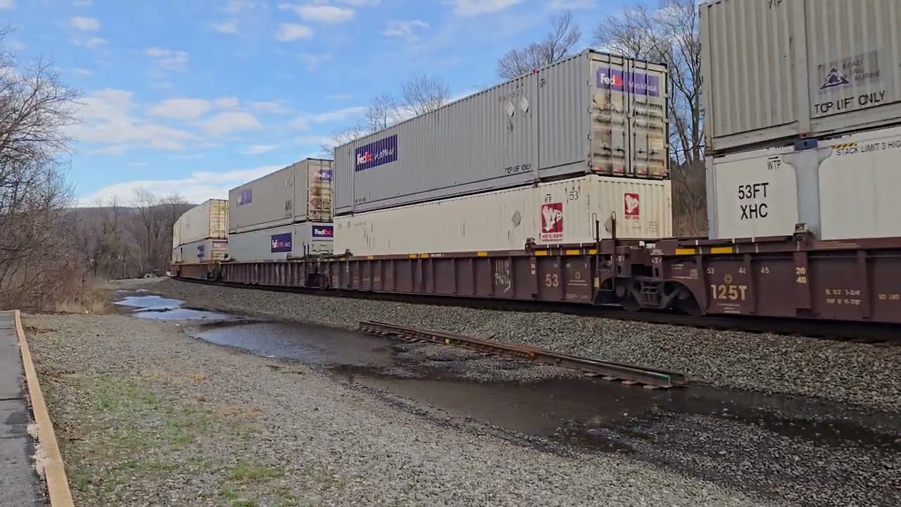 Westbound intermodal and eastbound coal trains meet at Lewistown, PA (03/13/2026)