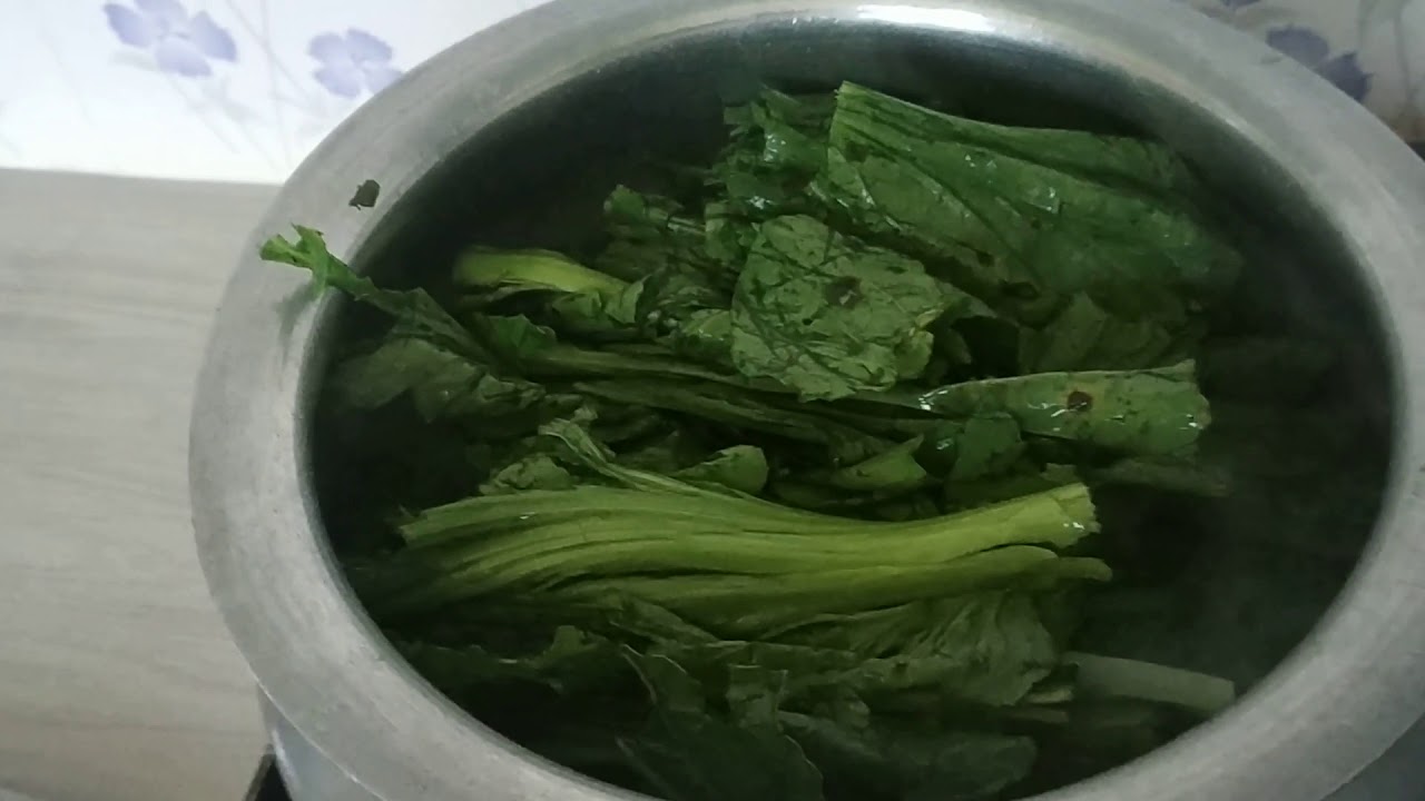 Boil vegetable lai patta( mustard leaf) or lai xak.