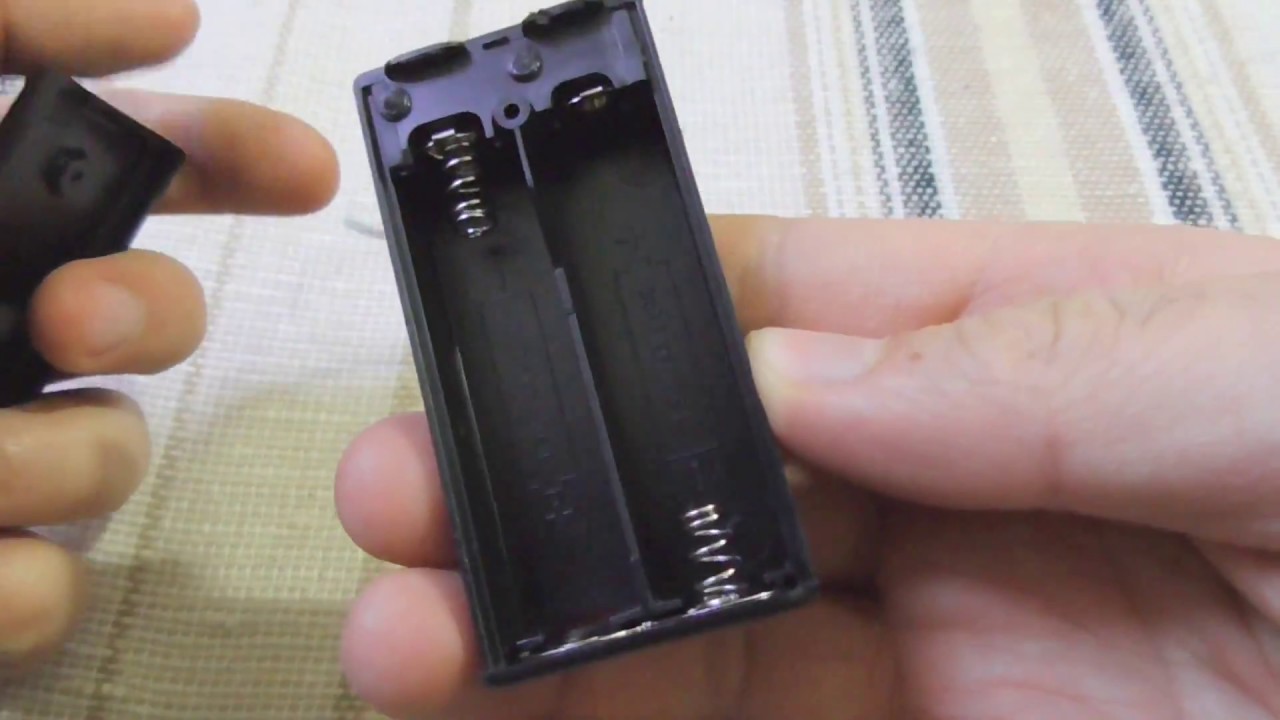 Battery holder with switch